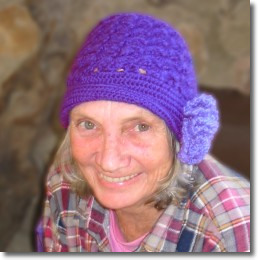 Jude wears one of  her crocheted hats